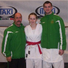 Aileach Karate Club's Denise Donaghey pictured with Irish national coach Bobby Morton and triple world champion Gordon Smith at last year's World Junior Championships in Itlay.