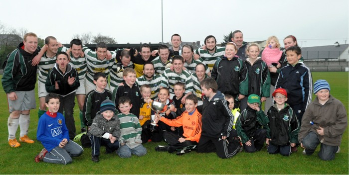Moville supporters and players celebrate their Ulster Junior Cup victory over Redcastle on Sunday, April 26, 2009.
