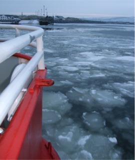 A view from the Lough Foyle Ferry during the recent record low temperatures as ice floes form in the water.