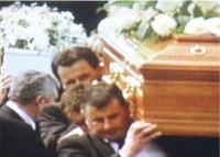 P.J. McDermott and other family members carry the coffins from St. Aengus Church.
