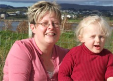 Kathleen McGeady and daughter Caitlin, 3, from Muff enjoy a picnic at Lisfannon during the unseasonal October weather.