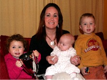 Sarah Quigley-Burns pictured with her children Líoda, Saorla and Cillian.