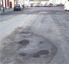 Potholes on Main Street in Moville.