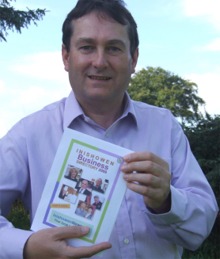 Brendan Deehan with a copy of the Inishowen Business Directory 2009