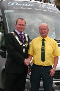 Buncrana Mayor Cllr Lee Tedstone pictured with coach operator Dessie Lynch outside the Harbour Inn, Lisfannon, Buncrana.