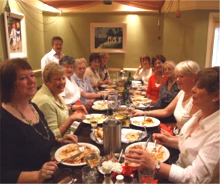 A women's golfing party enjoy the delicious Karma food.