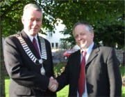 Buncrana Town Mayor, Cllr. Paul Bradley is congratulated by his deputy, Cllr. Peter McLaughlin.